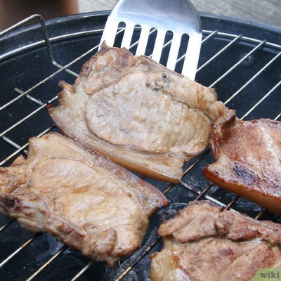 Cooking steak on barbecue