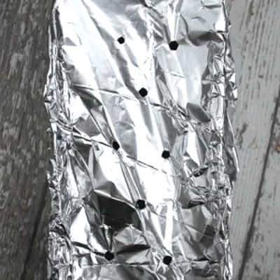 Using wood chips in aluminum foil